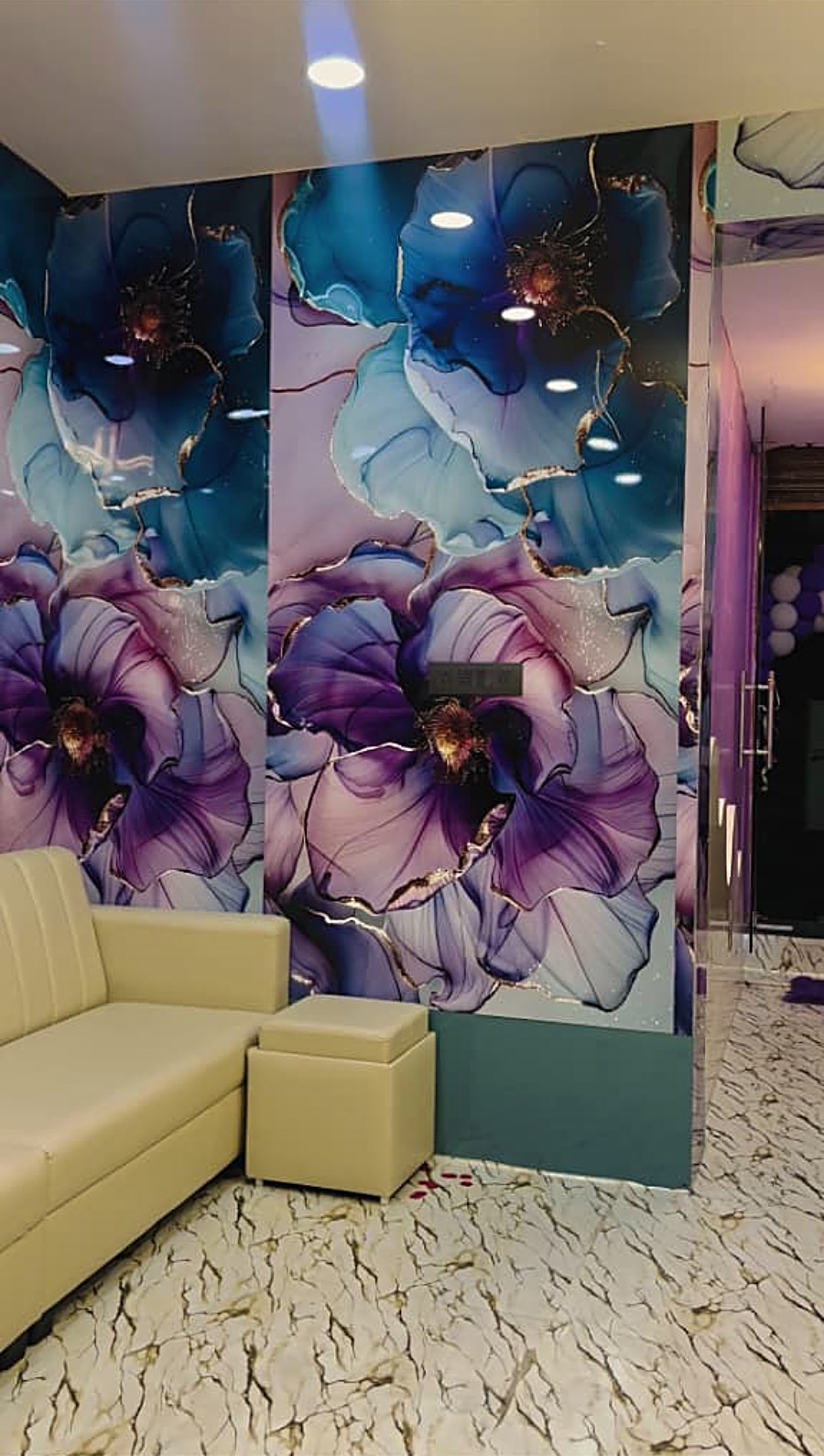 Client lounge with the signature floral wall